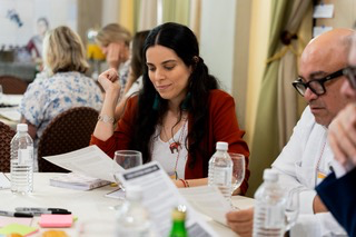 A woman taking a workshop